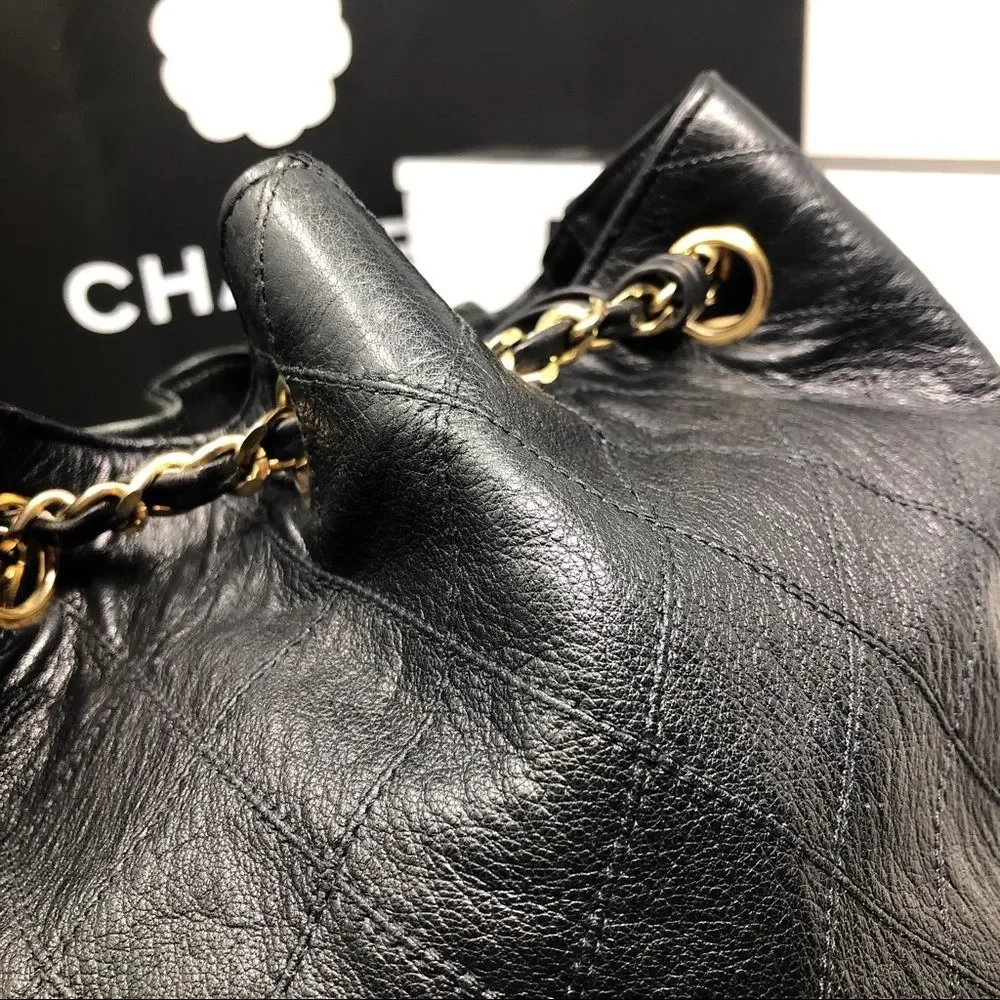 Vintage Chanel Black Lambskin Quilted CC Drawstring Bucket Bag Leather Backpack